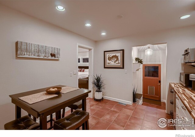 3421 4th St, Boulder, CO 80304 - dining space with light tile patterned flooring and recessed lighting