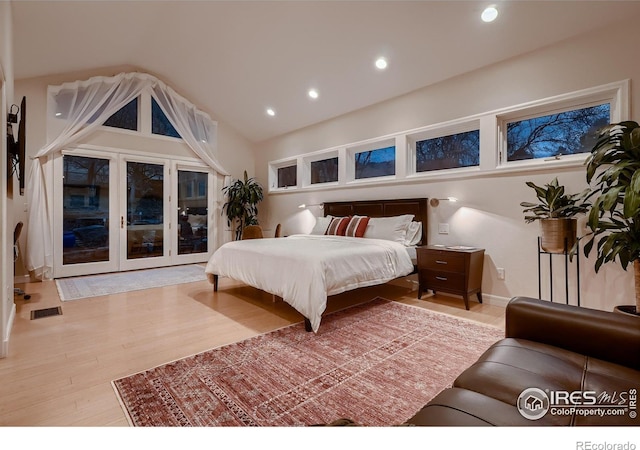 3421 4th St, Boulder, CO 80304 - bedroom with recessed lighting, wood finished floors, vaulted ceiling, and access to outside