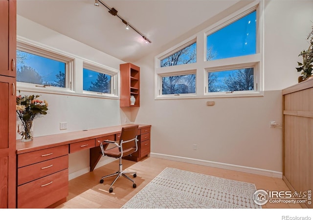 3421 4th St, Boulder, CO 80304 - office space with track lighting, built in study area, light wood-type flooring, and lofted ceiling