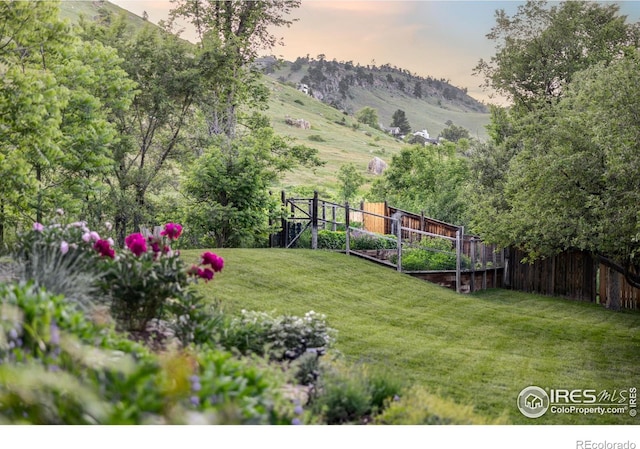 3421 4th St, Boulder, CO 80304 - view of yard featuring a garden and a mountain view