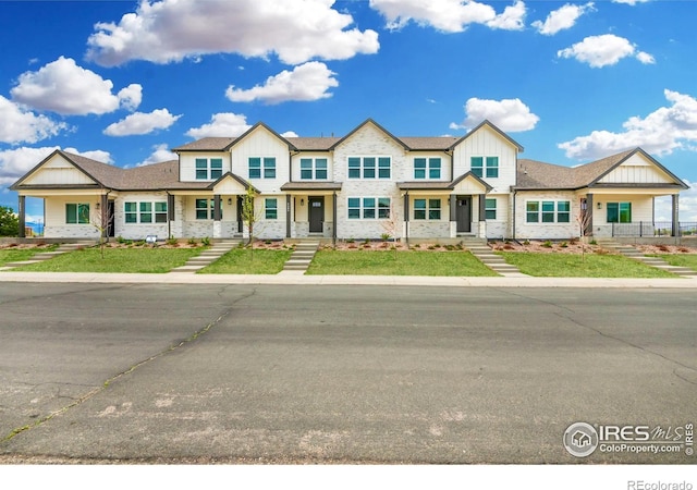 648 Greenspire Dr Unit 6, Windsor, CO 80550 - townhome / multi-family property with board and batten siding
