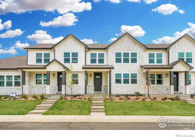 648 Greenspire Dr Unit 6, Windsor, CO 80550 - multi unit property featuring board and batten siding and a front lawn