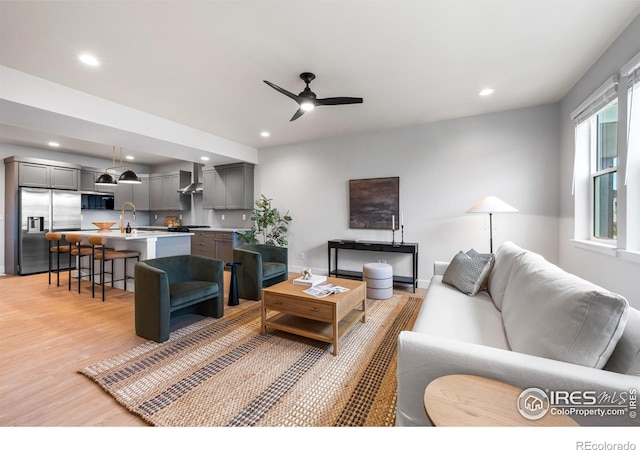 648 Greenspire Dr Unit 6, Windsor, CO 80550 - living room featuring light wood-type flooring, recessed lighting, and a ceiling fan