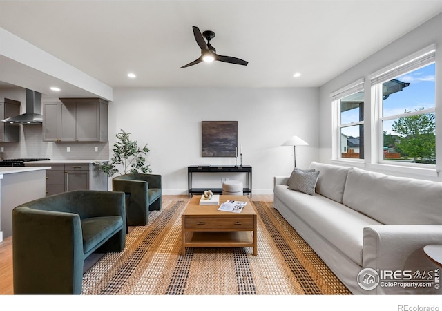 648 Greenspire Dr Unit 6, Windsor, CO 80550 - living area featuring a ceiling fan, recessed lighting, and light wood-style floors