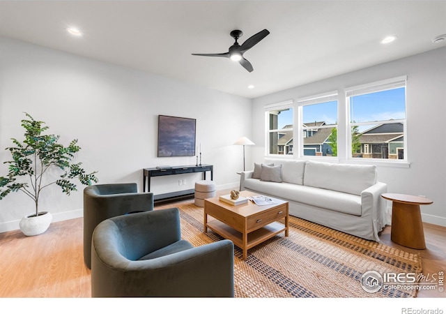 648 Greenspire Dr Unit 6, Windsor, CO 80550 - living room featuring a ceiling fan, light wood-type flooring, and recessed lighting