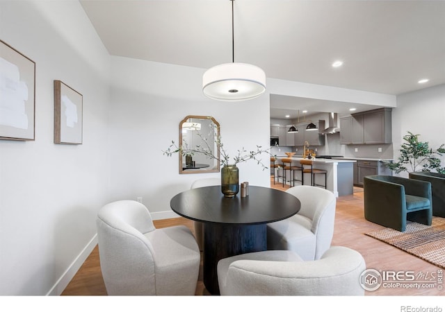 648 Greenspire Dr Unit 6, Windsor, CO 80550 - dining area featuring light wood-style flooring and recessed lighting