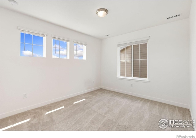 5226 Inland Ave, Firestone, CO 80504 - carpeted empty room featuring baseboards and a smoke detector