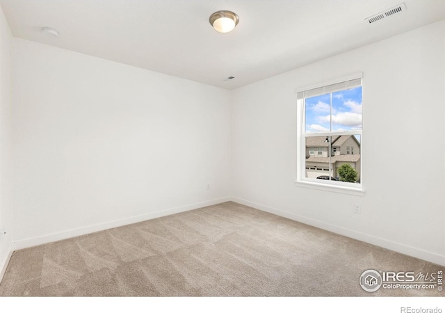 5226 Inland Ave, Firestone, CO 80504 - spare room with carpet and a smoke detector