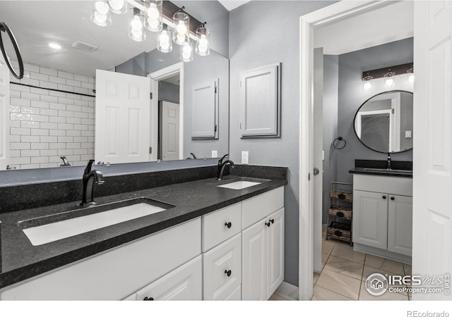 3531 Windmill Dr Unit 3, Fort Collins, CO 80526 - full bathroom with double vanity and tile patterned flooring