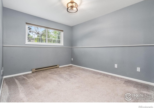 3531 Windmill Dr Unit 3, Fort Collins, CO 80526 - carpeted empty room featuring a baseboard radiator and baseboards