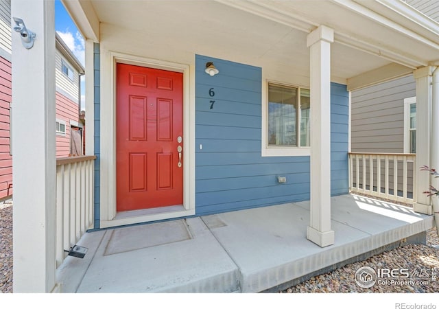 67 Quail Rd, Longmont, CO 80501 - property entrance with a porch