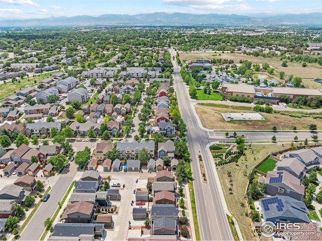 67 Quail Rd, Longmont, CO 80501 - aerial perspective of suburban area featuring mountains