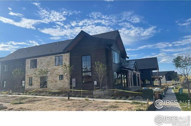 917 Latigo Loop, Lafayette, CO 80026 - view of front facade with stone siding