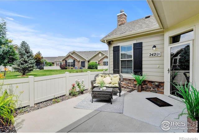 2421 Santa Fe Dr Unit B, Longmont, CO 80504 - view of patio featuring an outdoor living space