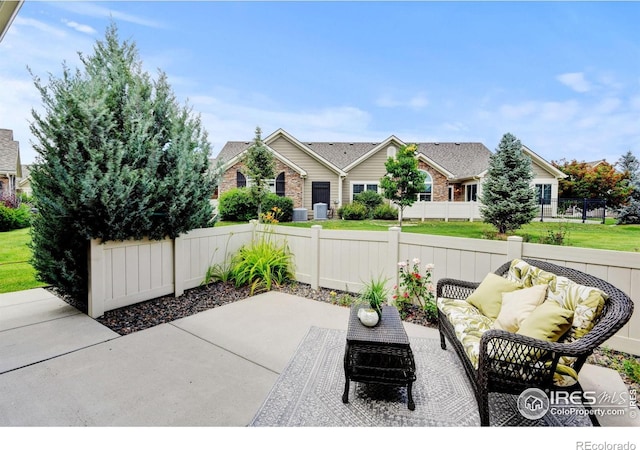 2421 Santa Fe Dr Unit B, Longmont, CO 80504 - view of patio / terrace featuring an outdoor living space