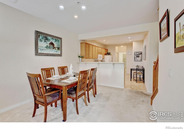2421 Santa Fe Dr Unit B, Longmont, CO 80504 - dining area featuring light carpet and recessed lighting
