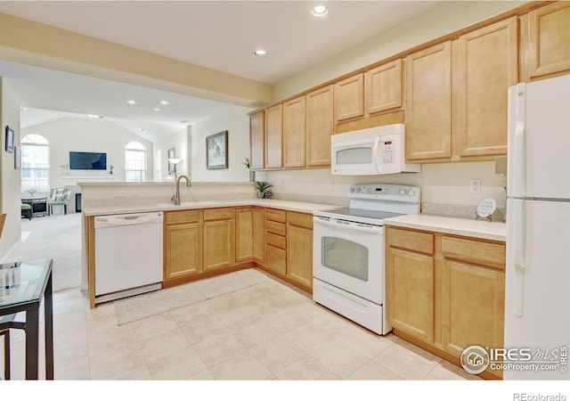 2421 Santa Fe Dr Unit B, Longmont, CO 80504 - kitchen with white appliances, light brown cabinets, recessed lighting, a peninsula, and light countertops