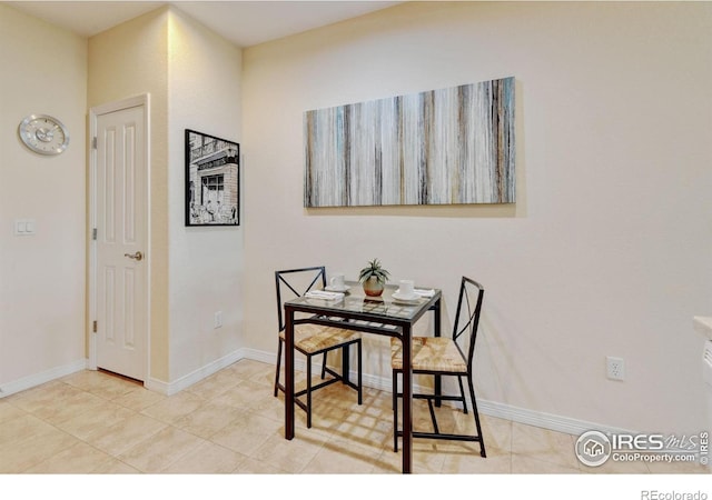 2421 Santa Fe Dr Unit B, Longmont, CO 80504 - dining space with baseboards and tile patterned floors