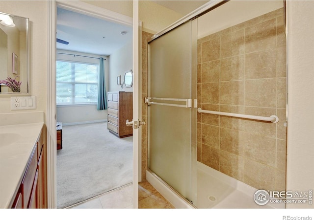 2421 Santa Fe Dr Unit B, Longmont, CO 80504 - bathroom with a shower stall, vanity, and tile patterned flooring