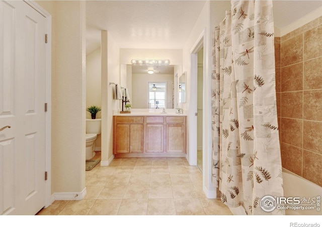 2421 Santa Fe Dr Unit B, Longmont, CO 80504 - bathroom featuring vanity and shower / tub combo with curtain