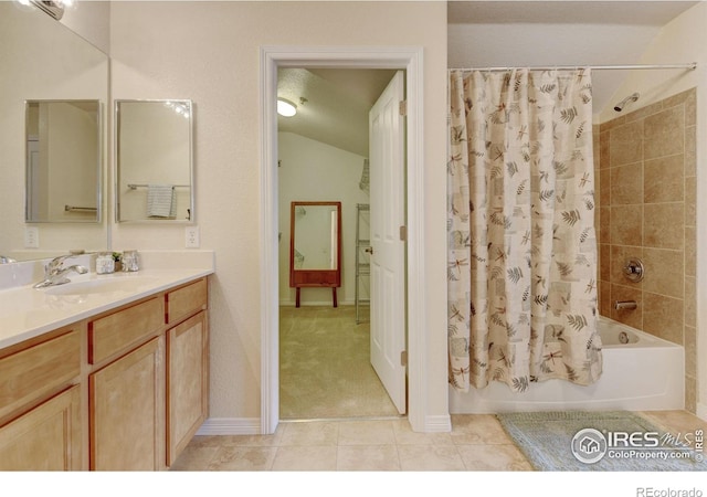 2421 Santa Fe Dr Unit B, Longmont, CO 80504 - full bath featuring vanity, shower / bath combo, and tile patterned flooring