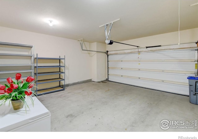 2421 Santa Fe Dr Unit B, Longmont, CO 80504 - garage featuring a garage door opener