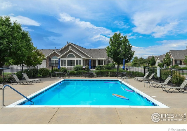 2421 Santa Fe Dr Unit B, Longmont, CO 80504 - community pool featuring a patio area