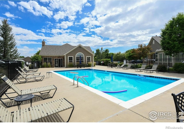 2421 Santa Fe Dr Unit B, Longmont, CO 80504 - community pool featuring a patio