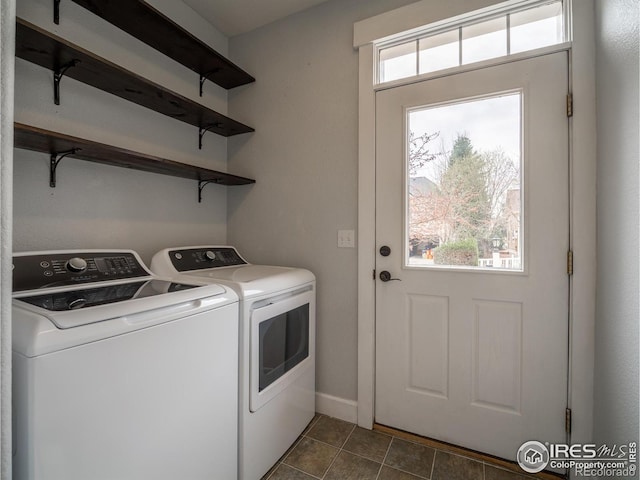 2946 Shoshone Trl, Lafayette, CO 80026 - laundry room with washer and dryer and baseboards