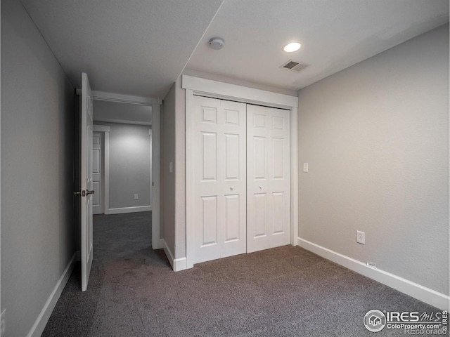2946 Shoshone Trl, Lafayette, CO 80026 - unfurnished bedroom with dark colored carpet and a closet