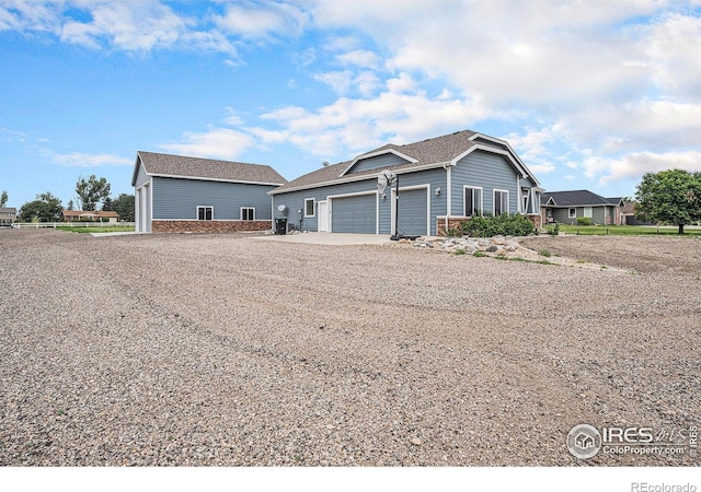 20199 Leola Way, Eaton, CO 80615 - view of front facade featuring driveway and a garage