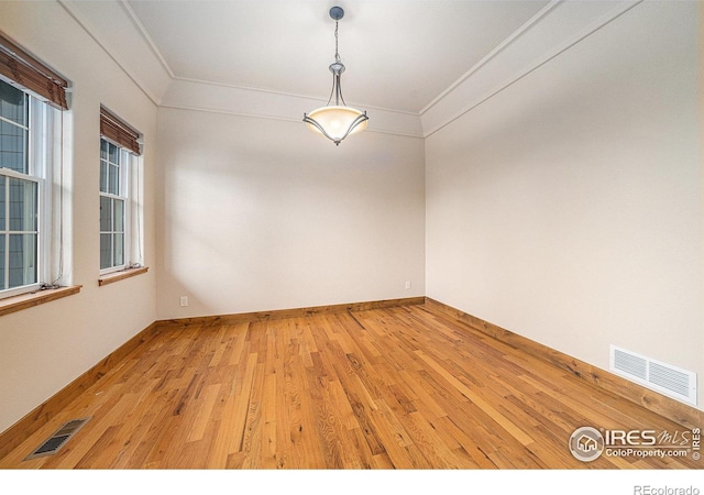 20199 Leola Way, Eaton, CO 80615 - spare room with crown molding and light wood-type flooring