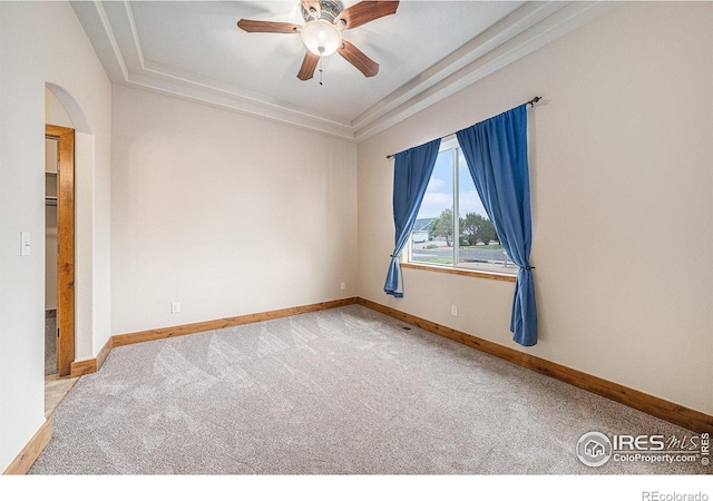 20199 Leola Way, Eaton, CO 80615 - carpeted spare room with a ceiling fan and arched walkways