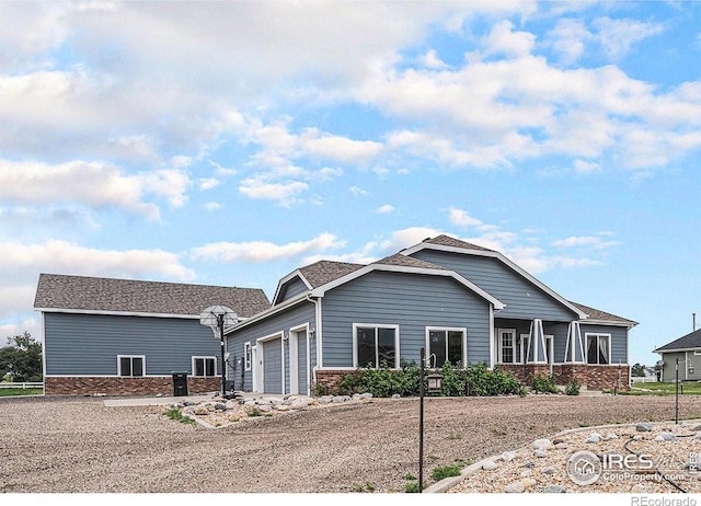 20199 Leola Way, Eaton, CO 80615 - view of front of property featuring an attached garage and brick siding