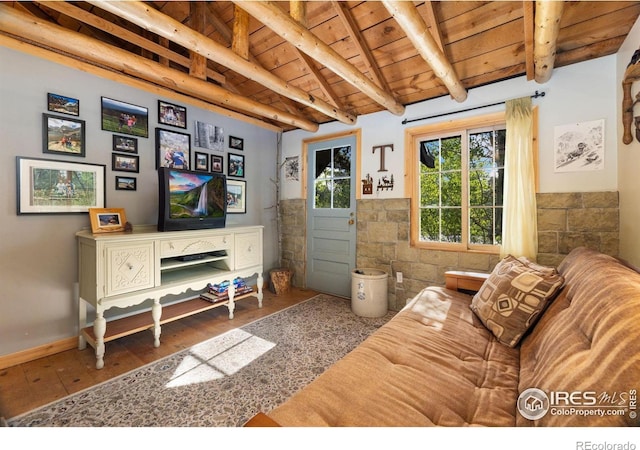 11614 Peak To Peak Hwy, Allenspark, CO 80510 - living room featuring a wooden ceiling with exposed beams and hardwood / wood-style floors