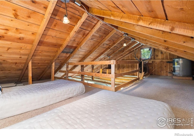 11614 Peak To Peak Hwy, Allenspark, CO 80510 - unfurnished bedroom with gas water heater, vaulted ceiling, carpet floors, and wooden ceiling