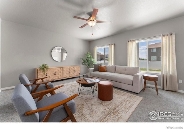 5612 Osbourne Dr, Windsor, CO 80550 - living area featuring carpet flooring and a ceiling fan