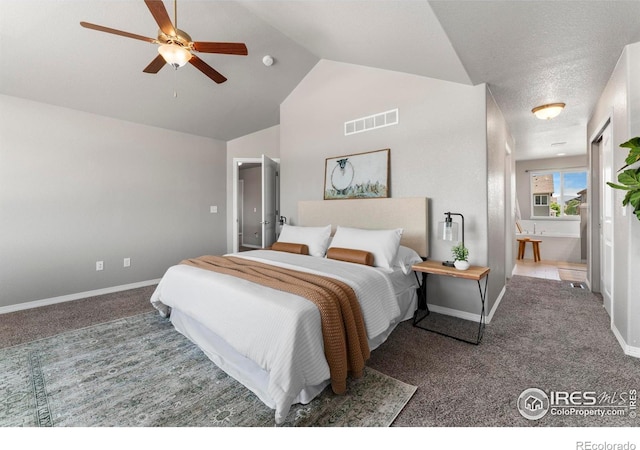 5612 Osbourne Dr, Windsor, CO 80550 - bedroom with carpet floors, lofted ceiling, ensuite bath, and ceiling fan