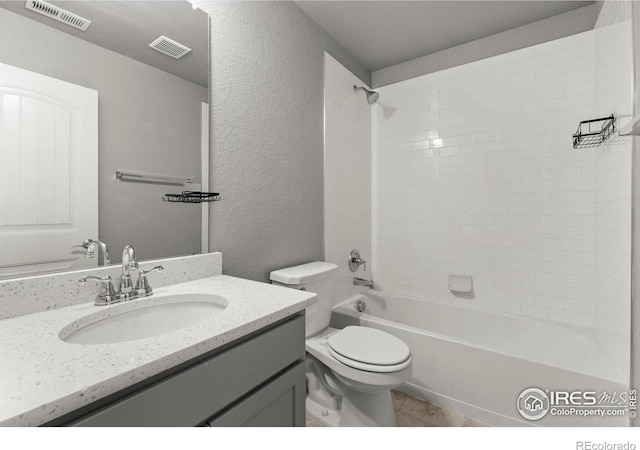 5612 Osbourne Dr, Windsor, CO 80550 - bathroom featuring vanity, shower / bathtub combination, tile patterned flooring, and a textured wall