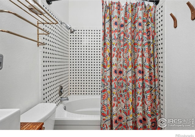 3593 S Gibralter Cir, Aurora, CO 80013 - bathroom featuring toilet and shower / bathtub combination with curtain