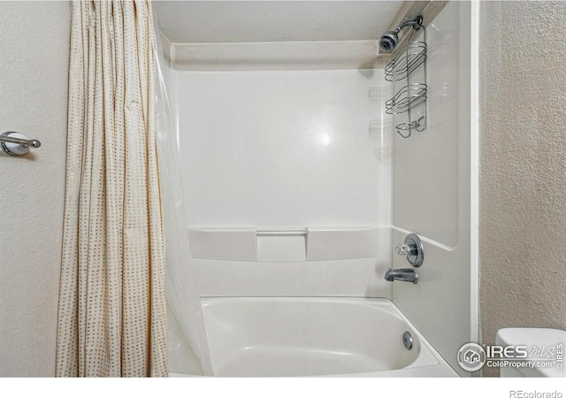3593 S Gibralter Cir, Aurora, CO 80013 - bathroom featuring shower / bath combination with curtain