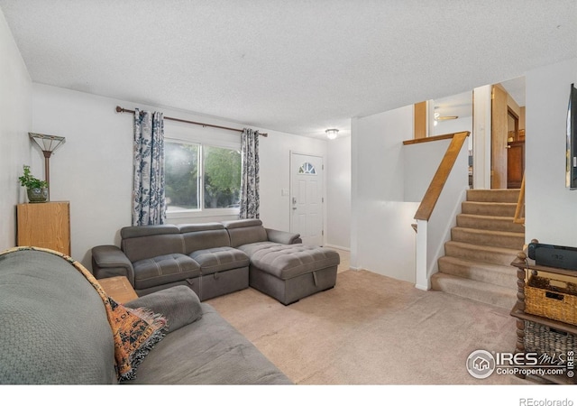 3920 Windom St, Fort Collins, CO 80526 - carpeted living area featuring stairway and a textured ceiling