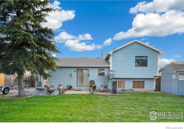 3920 Windom St, Fort Collins, CO 80526 - back of property featuring a patio, a storage shed, and an outdoor fire pit