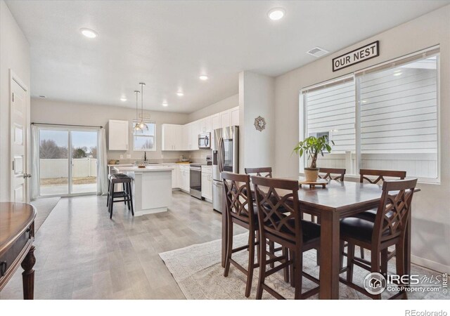 362 Bozeman Trl, Ault, CO 80610 - dining room featuring recessed lighting and light wood finished floors