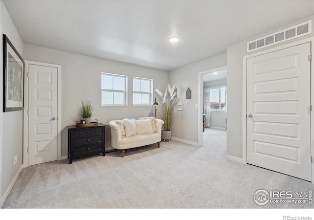 362 Bozeman Trl, Ault, CO 80610 - living area with carpet and healthy amount of natural light