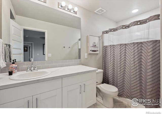362 Bozeman Trl, Ault, CO 80610 - full bath featuring vanity, a shower with curtain, and decorative backsplash