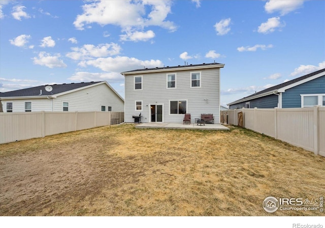 362 Bozeman Trl, Ault, CO 80610 - rear view of property with a patio and a fenced backyard