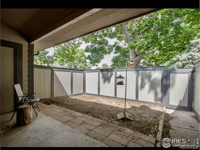 1325 Birch St Unit 12, Fort Collins, CO 80521 - fenced backyard with a patio
