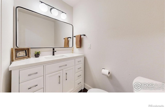 1403 Crestridge Dr, Loveland, CO 80537 - bathroom featuring toilet and vanity