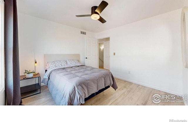 1403 Crestridge Dr, Loveland, CO 80537 - bedroom featuring wood finished floors and ceiling fan